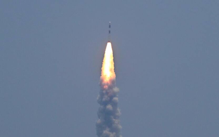 PSLV XL rocket carrying the Aditya-L1 spacecraft, the first space-based Indian observatory to study the Sun, is launched from the Satish Dhawan Space Centre in Sriharikota on September 02, 2023. The latest mission in India's ambitious space programme blasted off September 2, on a voyage to the centre of the solar system, a week after the country's successful unmanned Moon landing. Aditya-L1 is carrying scientific instruments to observe the Sun's outermost layers, launching shortly before midday to begin its four-month journey. (Photo by R. Satish BABU / AFP)