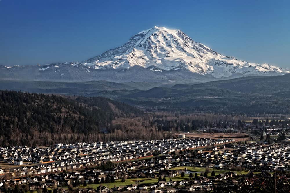 Mount Rainier volcano looms over Puyallup Valley, near Orting, Washington.