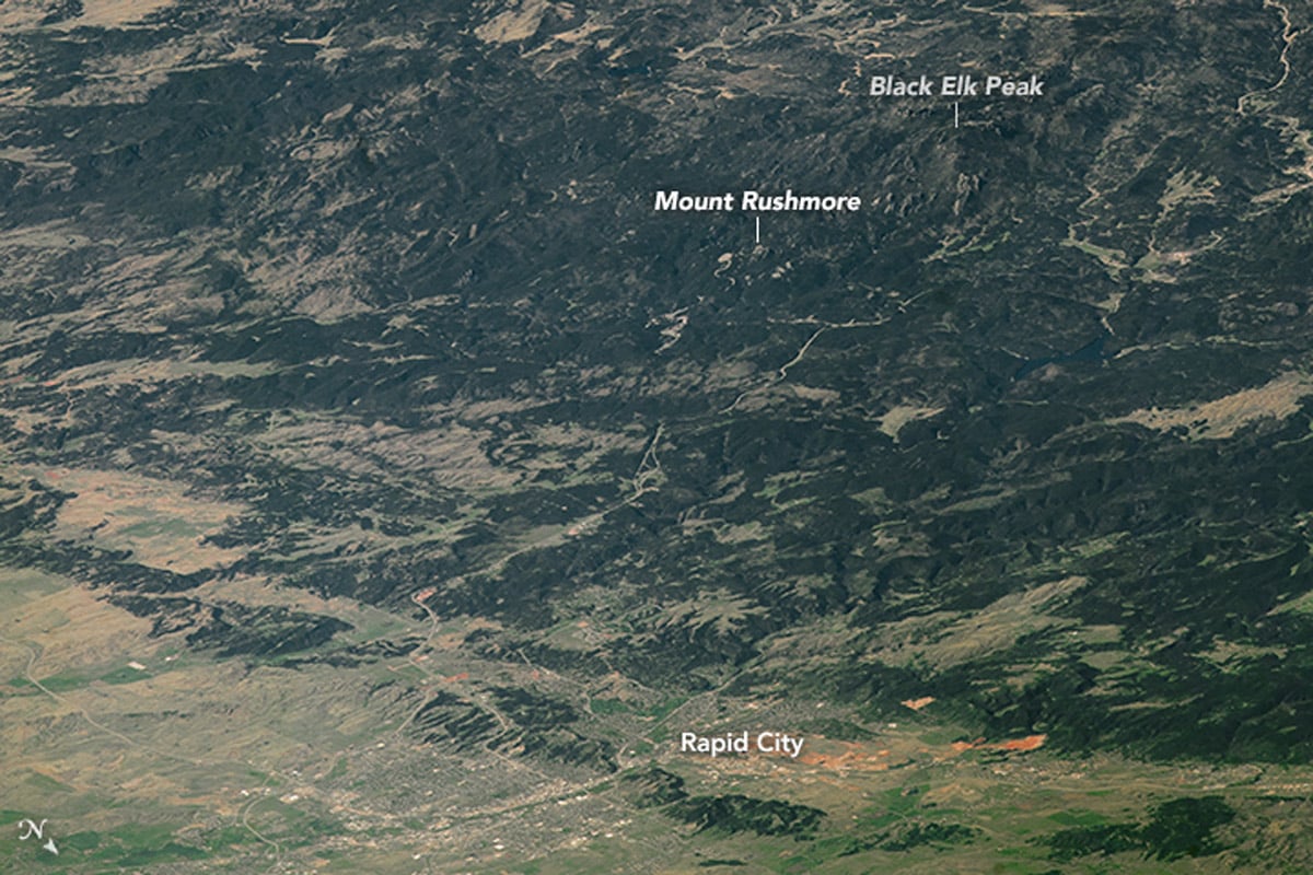 A view of the Black Hills area from space with labels for Mount Rushmore and Black Elk Peak.