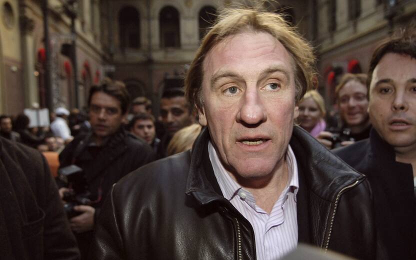 File photo - "French actor Gerard Depardieu attends Francesco Smalto's men Fall-Winter 2006-2007 collection presentation held at ""L'Ecole des Beaux-Arts"" in Paris, France, January 30, 2006. French actor Gerard Depardieu has been charged with rape and sexual assault allegedly committed in 2018 against an actress in her 20s. The 72-year-old is alleged to have repeatedly attacked the young woman who cannot be named for legal reasons over a number of days in August 2018. Photo by Nicolas Gouhier/ABACAPRESS.COM"