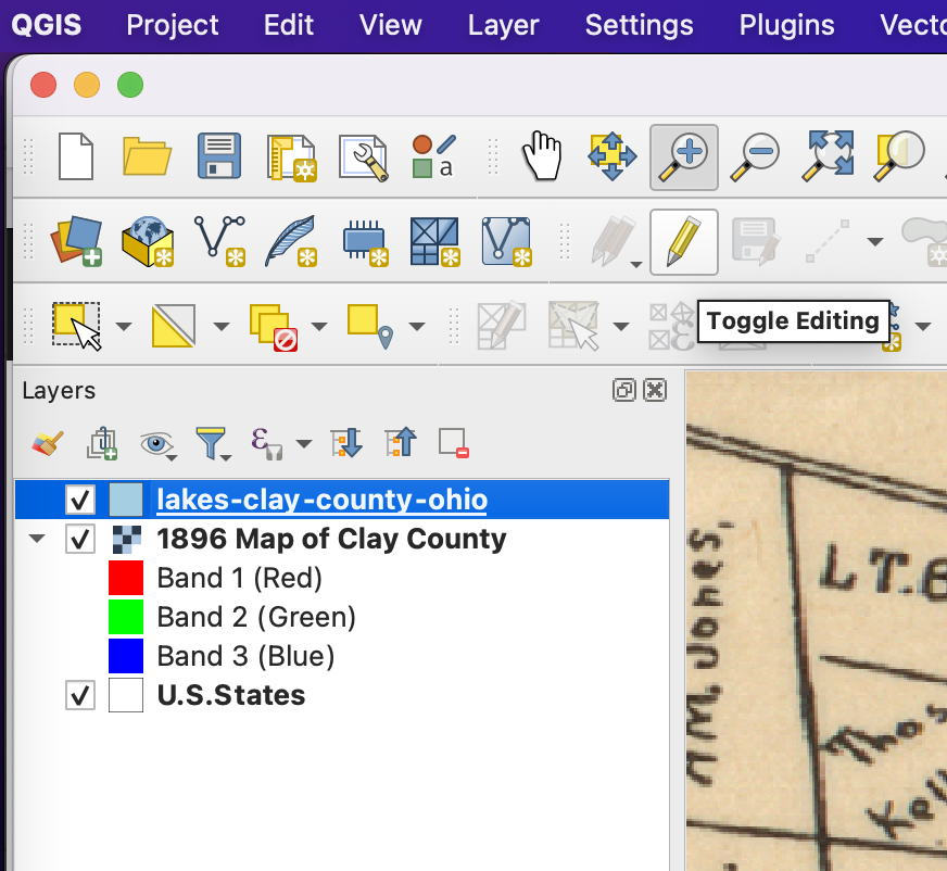 Screenshot showing the pencil icon tool that toggles editing on in QGIS.