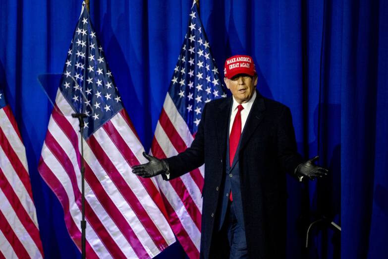 Former US President Donald Trump takes the stage during a "Get Out The Vote" rally in Waterford Township, Michigan, US, on Saturday, Feb. 17, 2024. Twenty-two Republican-led states urged the US Supreme Court to delay Donald Trump's criminal trial for election interference, casting the federal prosecution as an effort to undermine his campaign to recapture the White House. Photographer: Nic Antaya/Bloomberg via Getty Images