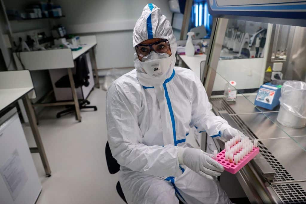 A laboratory operator wearing a protective gear handles patients' samples in a laboratory of the National Reference Center (CNR) for respiratory viruses at the Institut Pasteur in Paris on January 28, 2020. - The CNR analyses the tests for respiratory viruses among which coronavirus. The deadly new coronavirus that has broken out in China, 2019-nCoV, has so far killed 106 people and infected over 4,000 -- the bulk of them in and around Wuhan. (Photo by Thomas SAMSON / AFP) (Photo by THOMAS SAMSON/AFP via Getty Images)