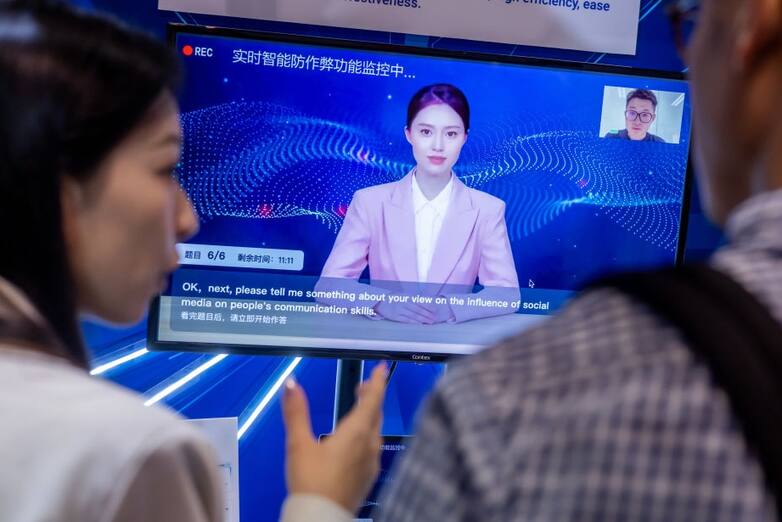 A demonstration of the digital human assistant for human resource at the video-based talent platform Duomian booth during the Career Connect Expo in Hong Kong, China, on Tuesday, May 7, 2024. Hong Kong and Greater Bay Area employers became less optimistic on hiring this year as bonus payments sank, underscoring the difficulties faced by the financial hub, according to a KPMG survey. Photographer: Paul Yeung/Bloomberg via Getty Images