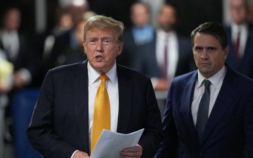 NEW YORK, NEW YORK - MAY 21: Former U.S. President Donald Trump with attorney Todd Blanche speaks to the media during his trial for allegedly covering up hush money payments at Manhattan Criminal Court on May 21, 2024 in New York City. Trump was charged with 34 counts of falsifying business records last year, which prosecutors say was an effort to hide a potential sex scandal, both before and after the 2016 presidential election. Trump is the first former U.S. president to face trial on criminal charges. (Photo by Curtis Means-Pool/Getty Images)