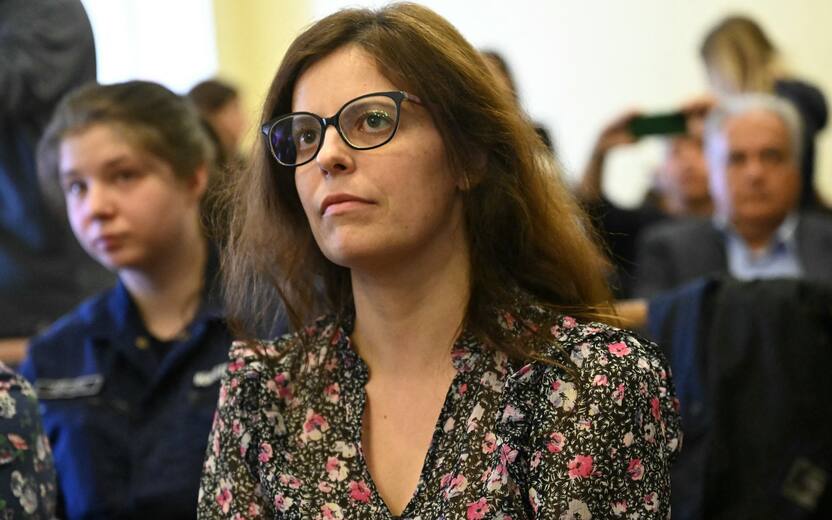 Italian teacher Ilaria Salis arrives in the Hungarian court of Budapest on March 28, 2024 ahead her trial for attacking neo-Nazis. Salis was arrested in Budapest in February 2023 and with three counts of attempted assault and accused of being part of an extreme left-wing organisation following a counter-demonstration against a neo-Nazi rally. (Photo by Attila KISBENEDEK / AFP)