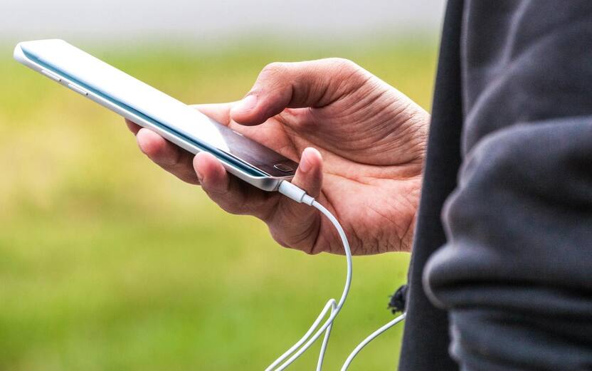 Close-up of a man using mobile phone, smartphone texting, mobile data, chat, using communication with friends information technology, internet