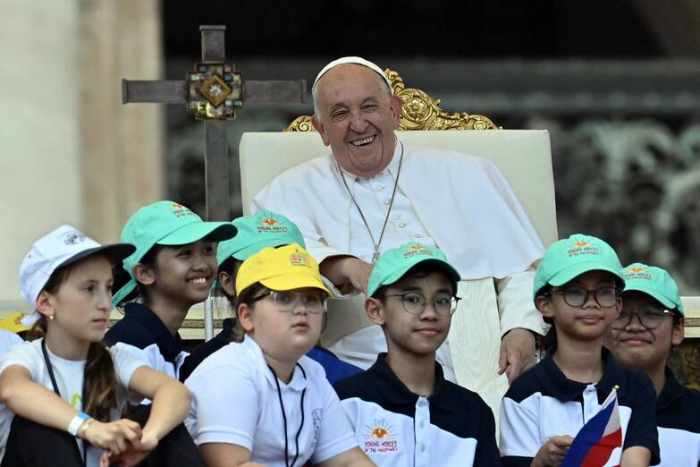 Pope Francis (up) listens to a speech during a mass on World Children's Day at St Peter's Basilica in the Vatican on May 26, 2024. (Photo by Filippo MONTEFORTE / AFP) (Photo by FILIPPO MONTEFORTE/AFP via Getty Images)