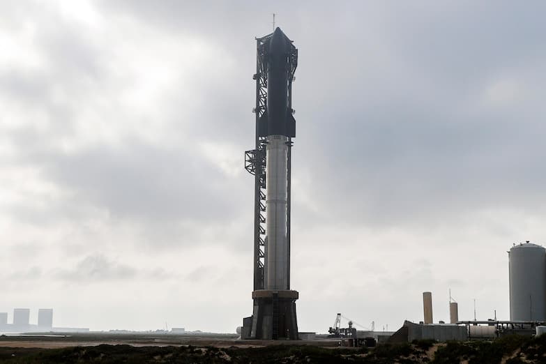 epa11219423 The mega rocket Starship is put in position before a test launch as SpaceX gets ready for their upcoming launch at Starbase in Boca Chica, Texas, USA, 13 March 2024. This will be the third attempt to test the mega rocket Starship. EPA/ADAM DAVIS