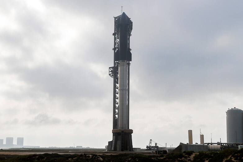 epa11219423 The mega rocket Starship is put in position before a test launch as SpaceX gets ready for their upcoming launch at Starbase in Boca Chica, Texas, USA, 13 March 2024. This will be the third attempt to test the mega rocket Starship. EPA/ADAM DAVIS
