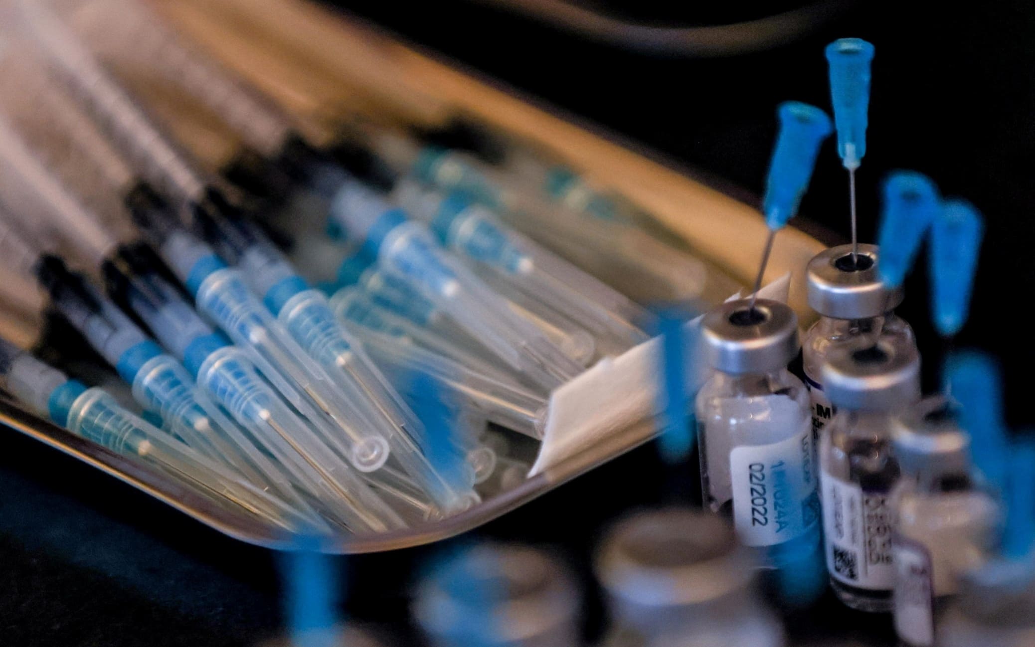 epa09666199 Syringes with Moderna vaccine against COVID-19 shots Sage are on display during a vacination campaign in a Beach Bar and Restaurant in Berlin, Germany, 04 January 2021.. In a measure to reach more people, restaurants and clubs in Berlin start a Covid-19 vaccination campaign, where citizens get their vacine shots at the clubs & restaurants in the German capital. EPA/FILIP SINGER