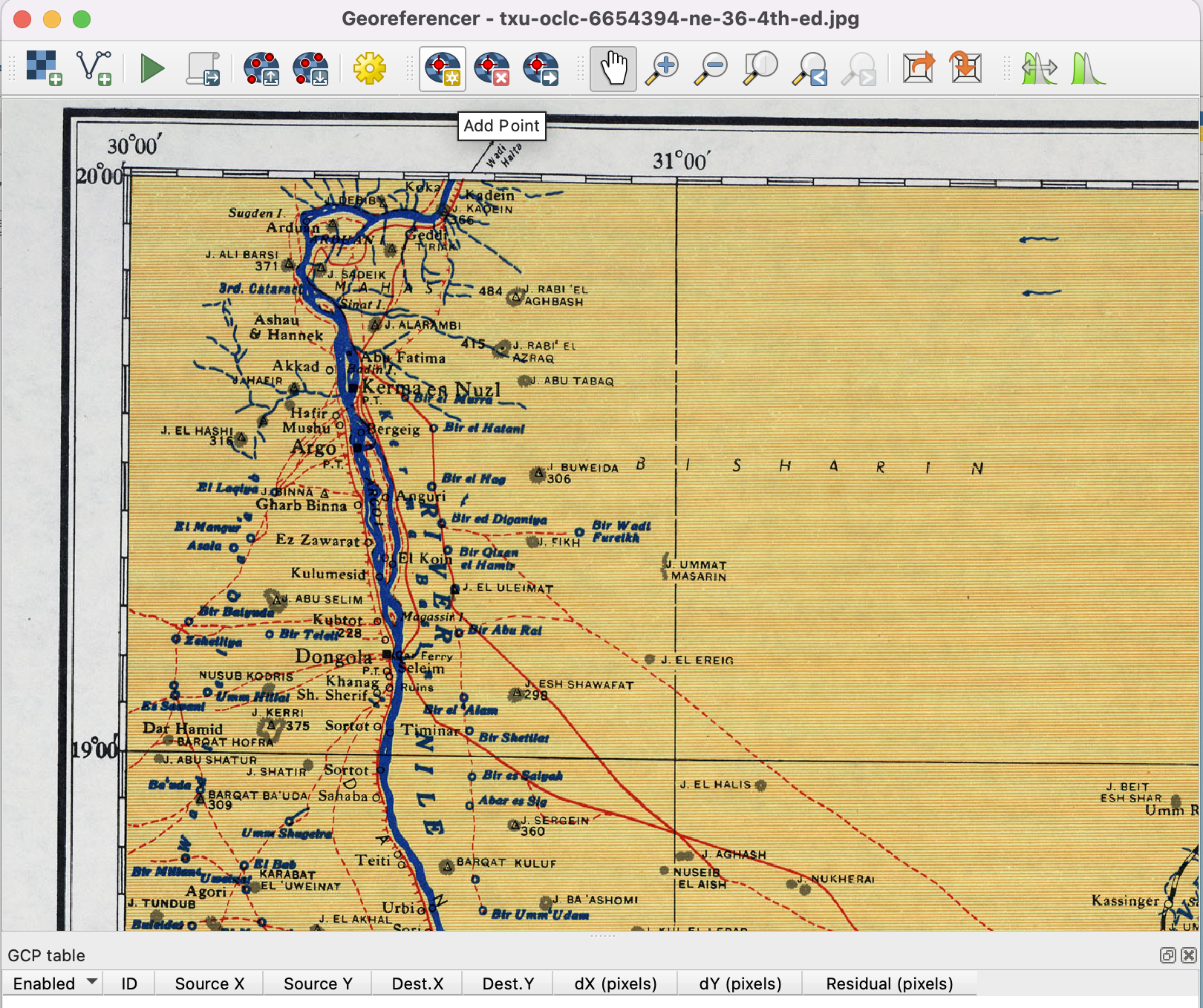 A close up look at the georeferencer window in QGIS with an old digitized map edge.